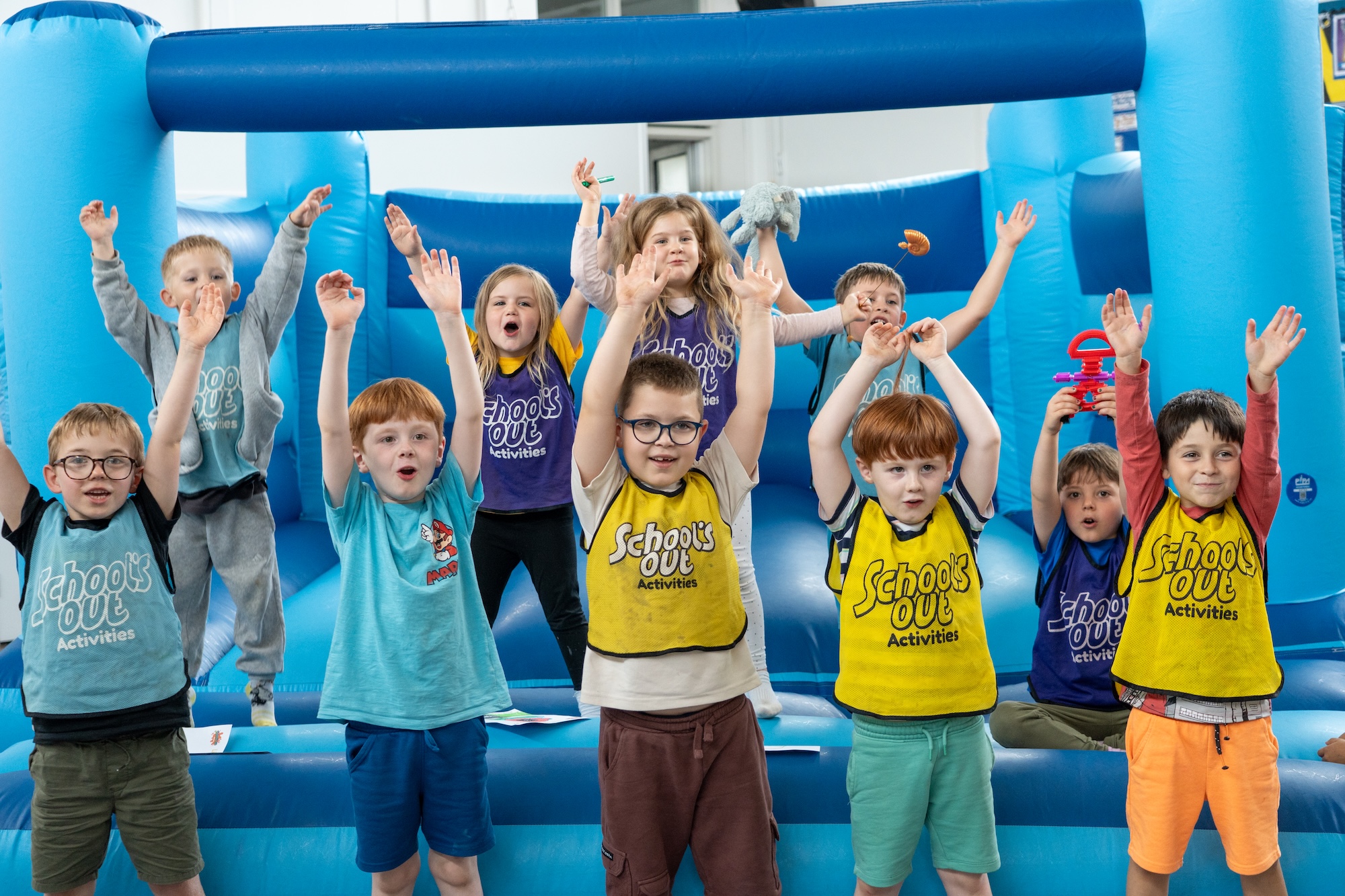 Kids having fun on the bouncy castle
