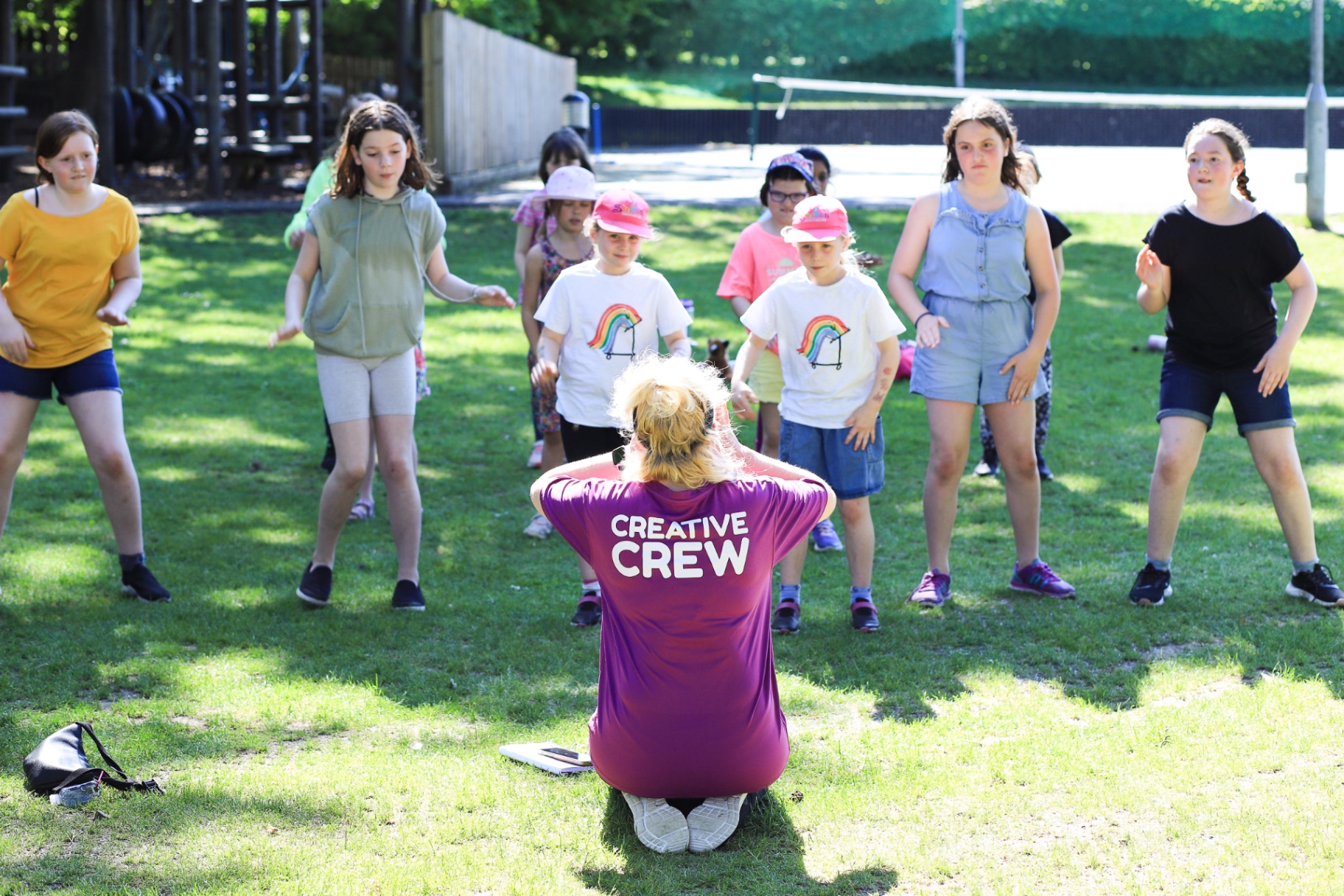 Creative Crew leader in purple uniform