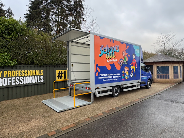 School's Out Luton van with tail-lift deployed